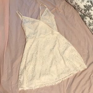 Adjustable neckline lace dress